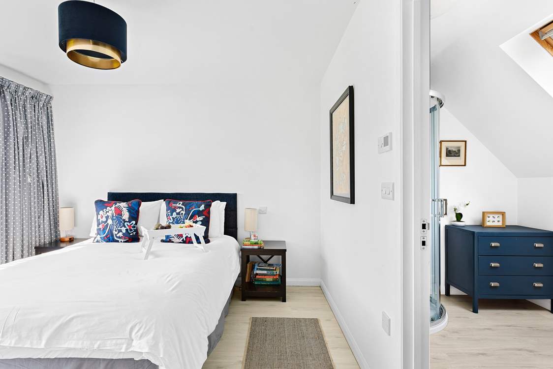 Elegant Bedroom 1 has a lovely en suite shower room and the added bonus of a walk-in dressing area.