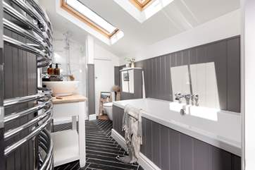 The family bathroom has a separate shower and a double ended bath, perfect for those who enjoy a leisurely soak