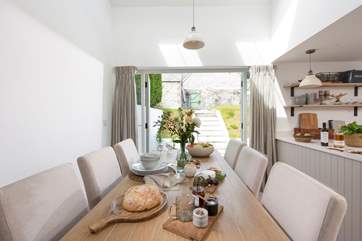 The doubles doors really let the light flood in and lead out to the garden and terrace at the back of the cottage