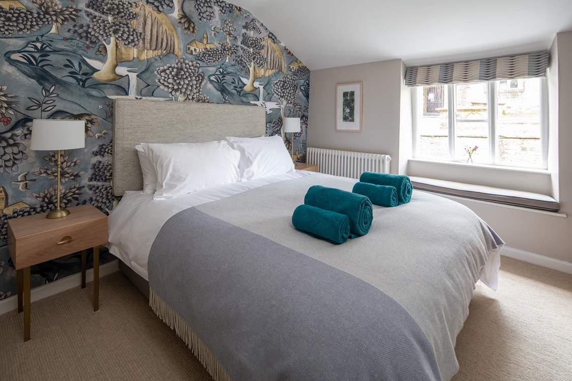 Gorgeous bedroom with pretty views over the church.
