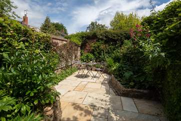 Thoughtfully landscaped, the courtyard garden is a gem.