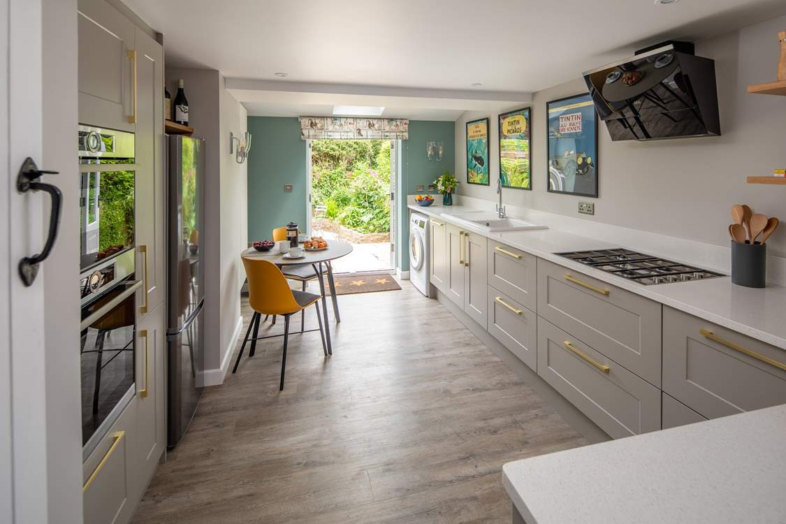French doors open out to the courtyard garden that is a real sun-trap.