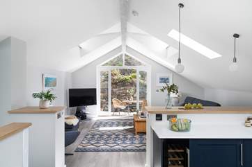 The wonderful open plan living area, perfect for relaxing after a day of exploring.