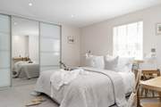 The dreamy, boutique-style main bedroom.