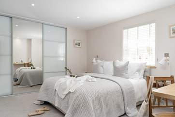 The dreamy, boutique-style main bedroom.