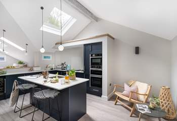The beautiful open plan kitchen area is fabulous and so sociable. 
