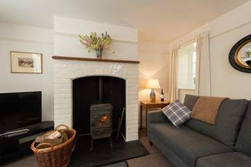 On those chillier days, curl up in front of the wood-burner.