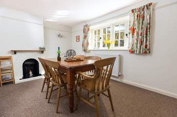 The dining room has plenty of space to enjoy meals in.
