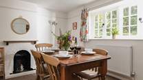 The dining-room has plenty of space to enjoy meals in.
