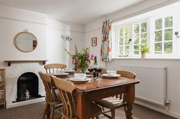 The dining room has plenty of space to enjoy meals in.