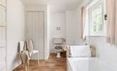 The recently refurbished bathroom looks out over rolling countryside. - Thumbnail Image