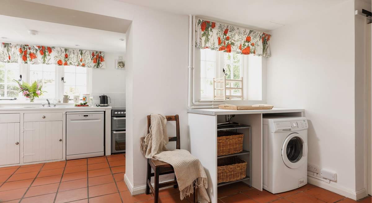 Entering through the side door, this is a great space for dogs and wellies! Behind the gorgeous wooden door is the handy WC.