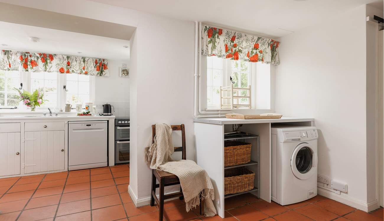 Entering through the side door, this is a great space for dogs and wellies! Behind the gorgeous wooden door is the handy WC.