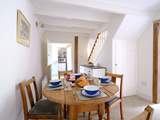 Sitting around the lovely oak table is the perfect place to discuss your adventures.