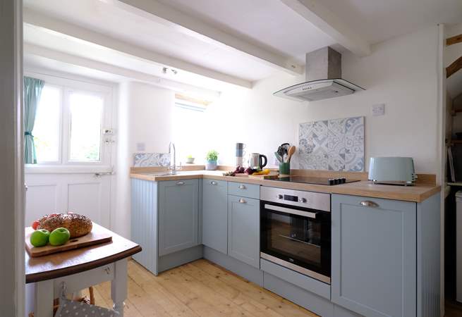Small but perfectly formed, the kitchen has all you'll need.
