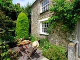 Summer welcomes you to the terraced garden.