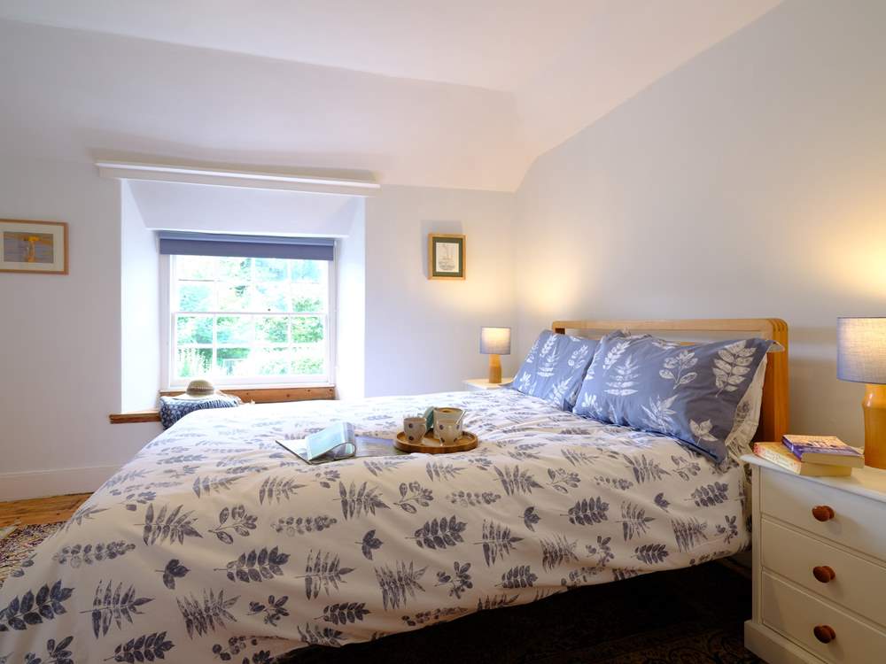 Bedroom one is simple yet stylishly furnished.