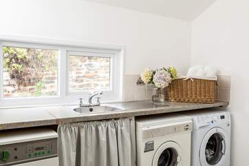 The handy utility-room has a washing machine and separate drier. The perfect room for all your beach clobber or walking clothes.