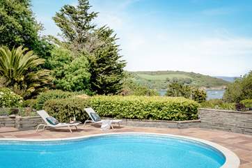 Relax on the sun loungers with a chilled glass of wine, you are on holiday after all.