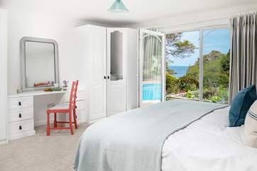 The main bedroom has the most incredible view over the creek and out to sea (bedroom 1).