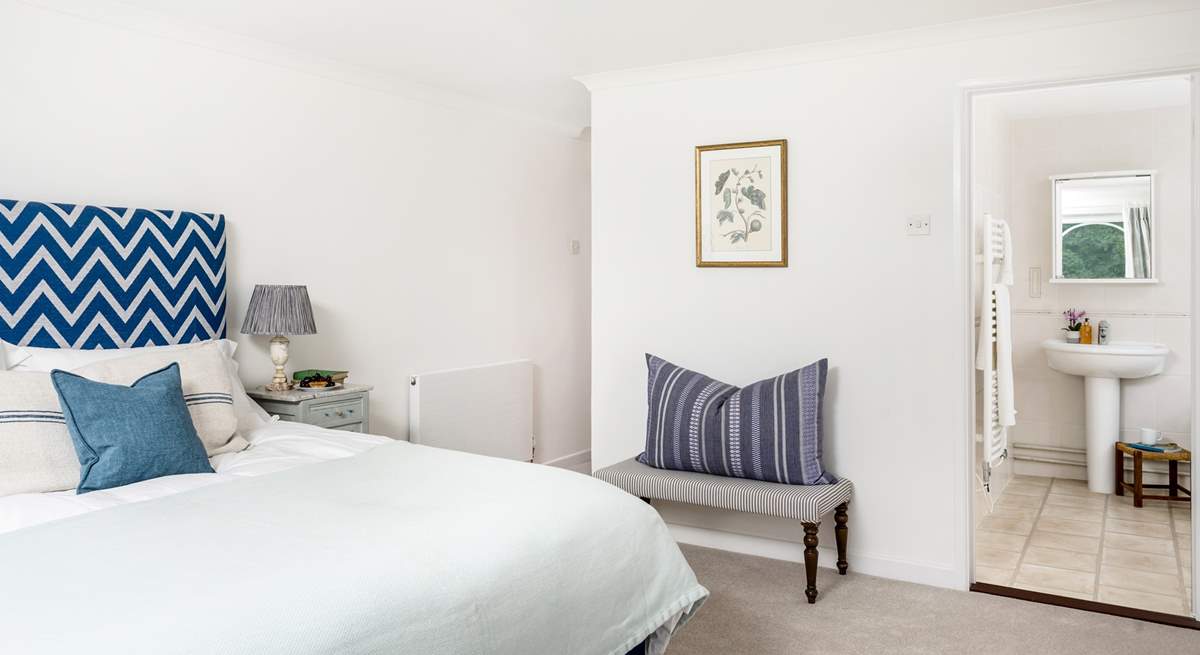 The main bedroom has a luxurious super-king (or twin) bed an en suite bathroom. 