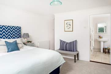The main bedroom has a luxurious super-king bed an en suite bathroom.