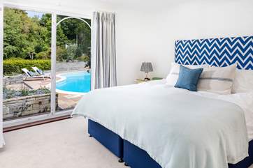 Steps lead straight out to the pool area from your bedroom.
