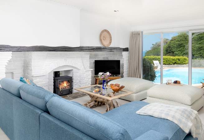 Sit back and relax on the squishy sofas in front of the cosy fire. 