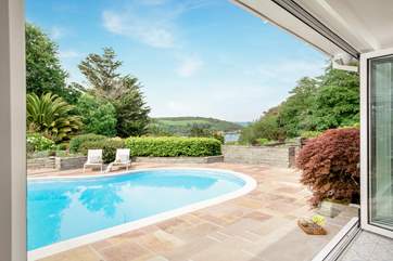 Open the bi-fold doors and look at that view! Perhaps enjoy a moment on the steps taking this lovely place in.