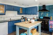The pretty kitchen has all you might need including a Nespresso machine.