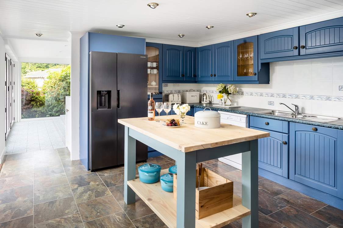 The kitchen leads through to the dining-room.