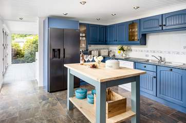 The kitchen leads through to the dining-room.