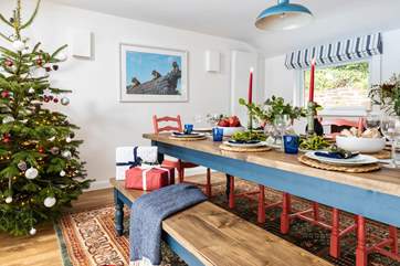 There is plenty of space for everyone to gather round the table for a festive family meal.