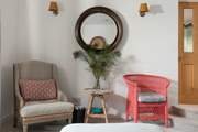 The Malawi cane chairs are a stunning and comfortable addition to the seating area.