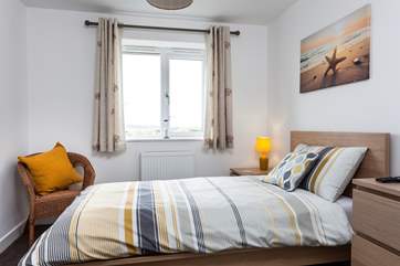 Bedroom 3 has a single bed with views across the fields.