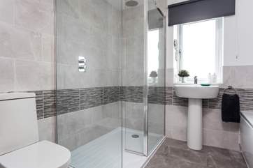 A waterfall shower in the main bathroom.