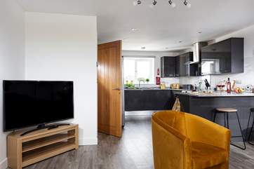 The open plan living and kitchen areas are perfect for a social holiday.