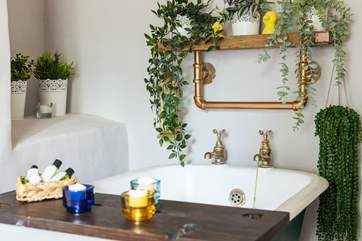 Enjoy a blissful soak in the luxurious bath tub.