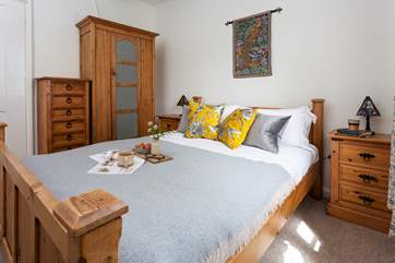 The double bed in bedroom 2.