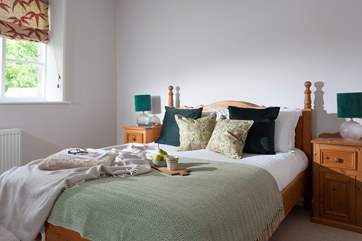 The double bed in bedroom 3.