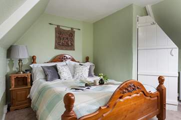 Onto the second floor and we have bedroom 5 with a double bed.