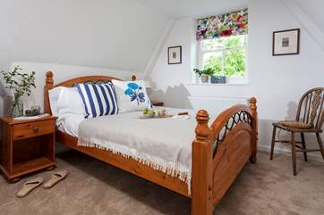 Lastly, bedroom 7 with a double bed and lovely views out the window.