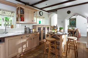 The well-equipped kitchen, supplied with a dishwasher and plenty of glasses to celebrate any occasion.