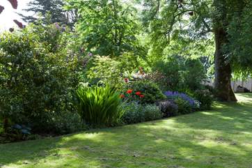 Catch the flowers lining the garden in full bloom over the warmer months. Beautiful.