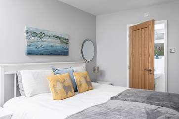 The main bedroom with a super-king size bed and en suite shower-room.