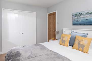 Plenty of storage in the main bedroom for your holiday belongings.