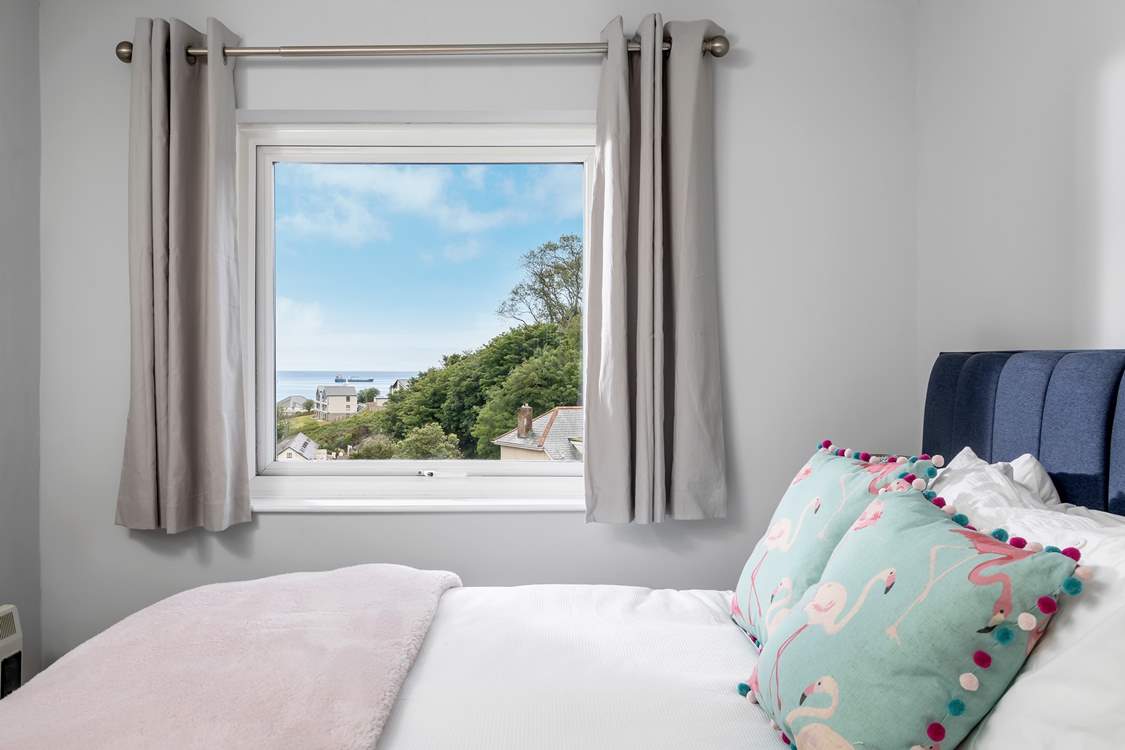 Bedroom 2 has a king-size bed and sea views.