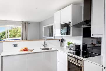 The swish kitchen in the open plan living-room.