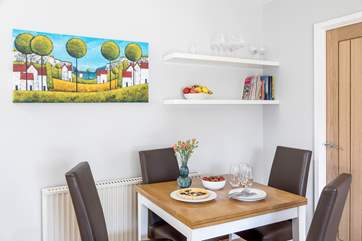Sit down to a delicious meal with a bottle of something good, you're on holiday after all. The table extends to comfortably sit six.