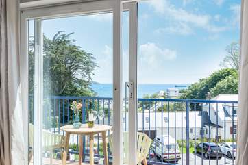 The balcony at Sea Dream is the perfect spot for al fresco dining with a view of Swanpool beach.